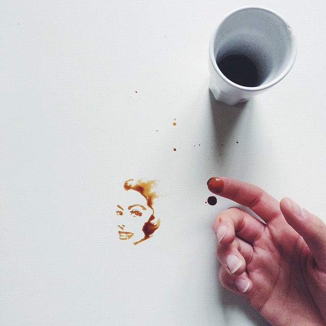 Artistic coffee spill creating an iconic figure