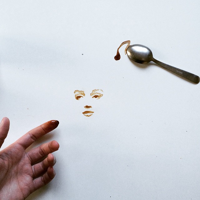 A clever composition with a spoon dripping coffee to create the illusion of a face