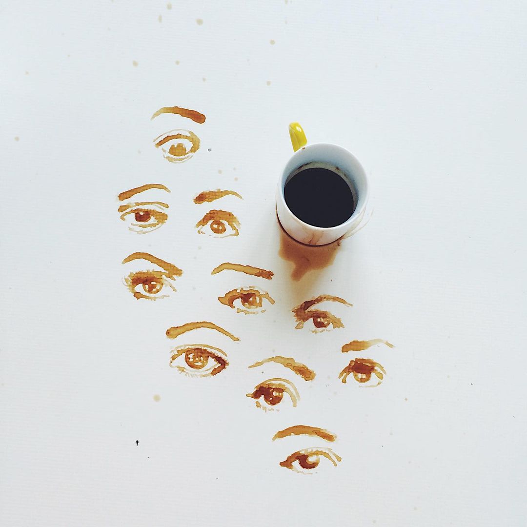 Artistic representation of eyes created with coffee spills