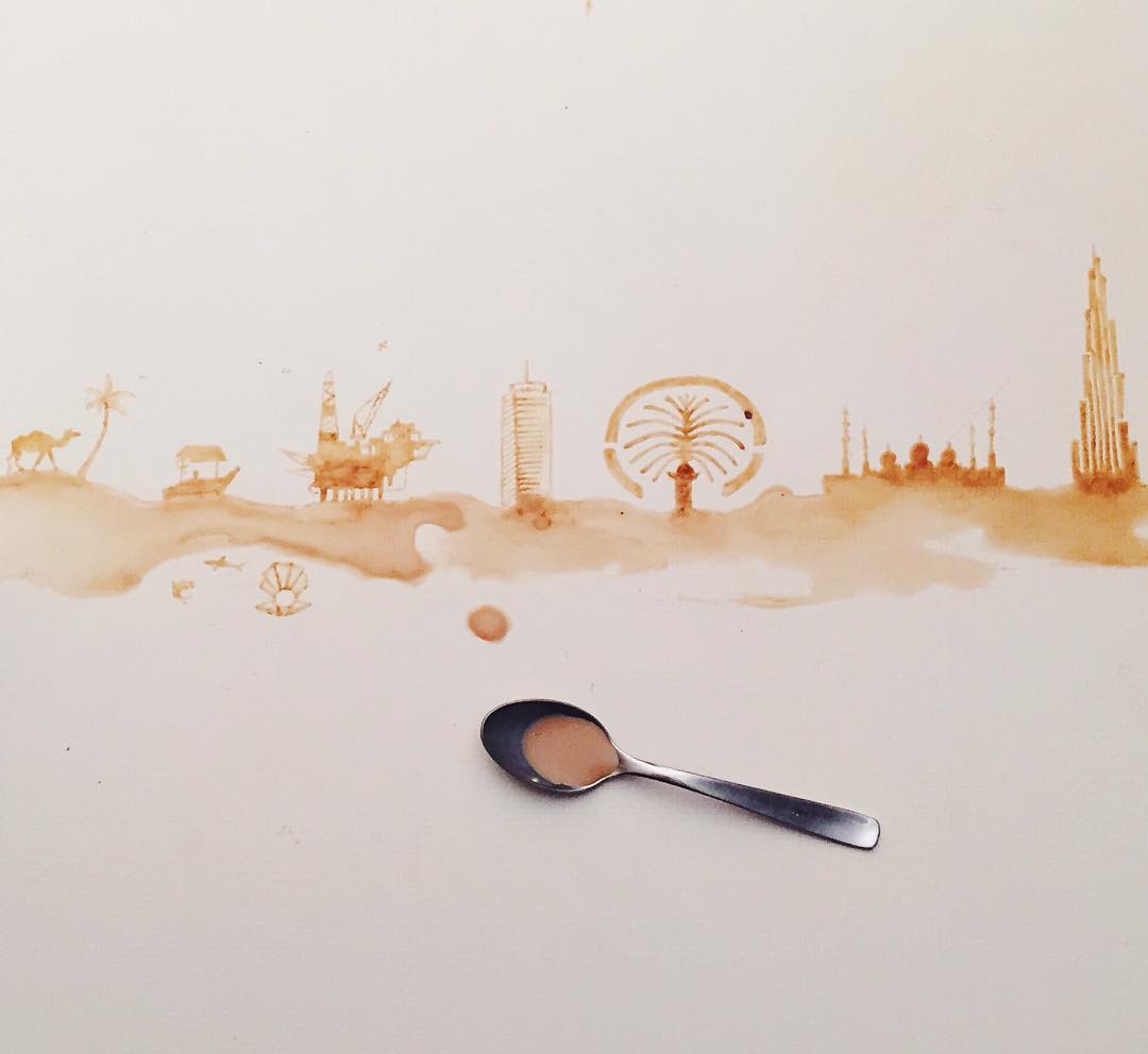 Artistic depiction of a cityscape created with coffee spills