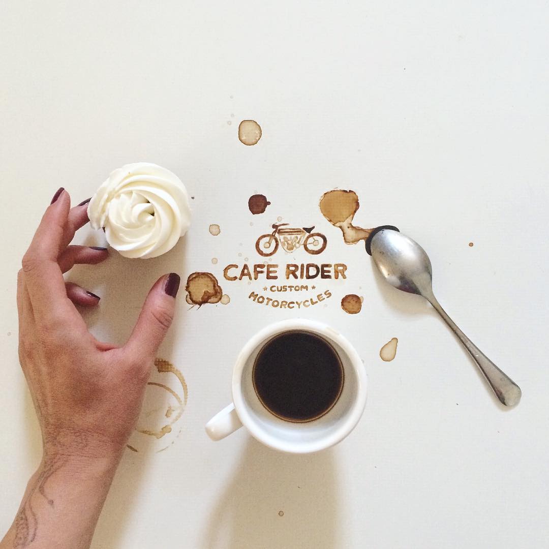 Coffee and dessert creatively arranged on a table with artistic coffee stains