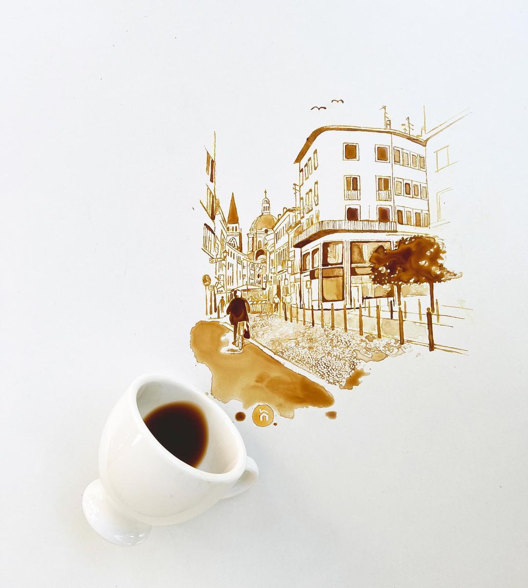 A uniquely artistic composition combining spilled coffee and a sketched cityscape