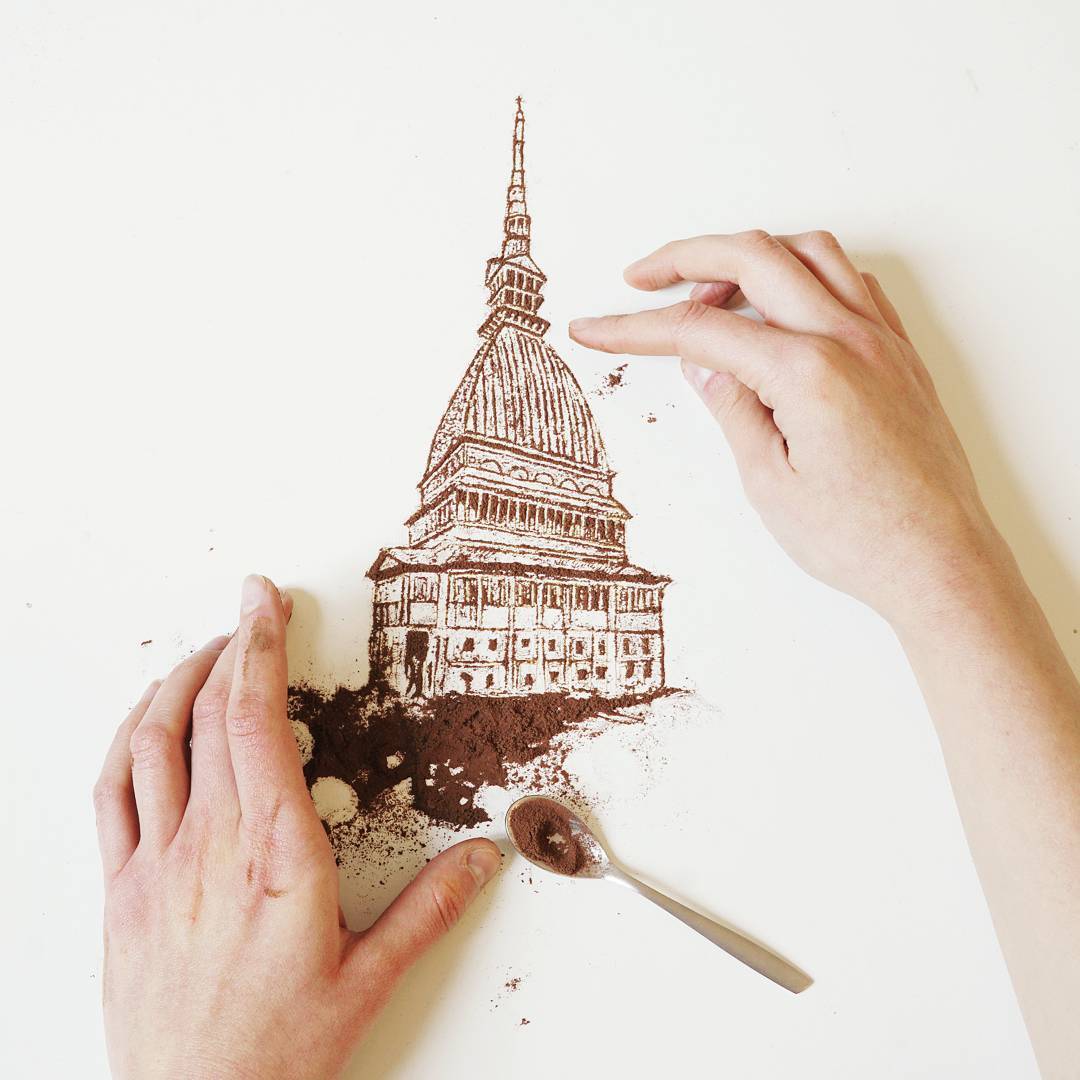 An artistic depiction of a historical building created with coffee grounds