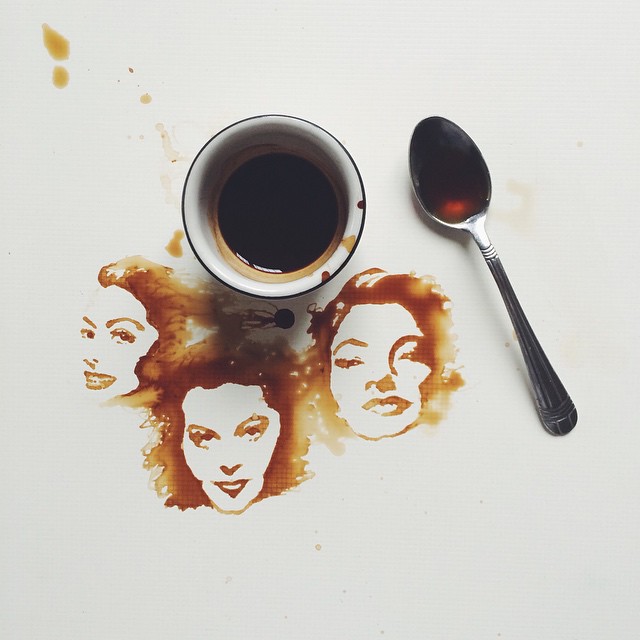 Artistic depiction of three faces created with coffee stains