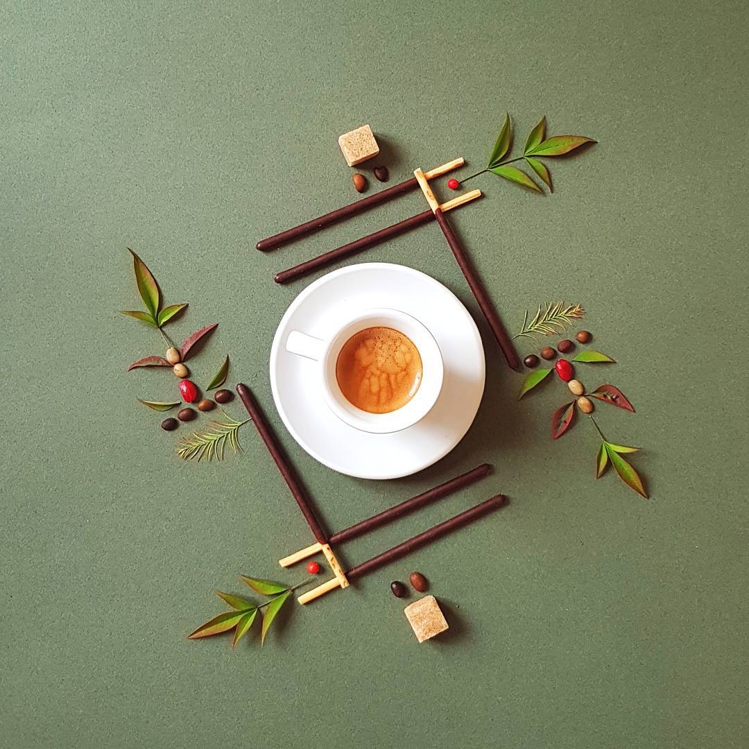 Artistic Coffee Arrangement on a Green Background