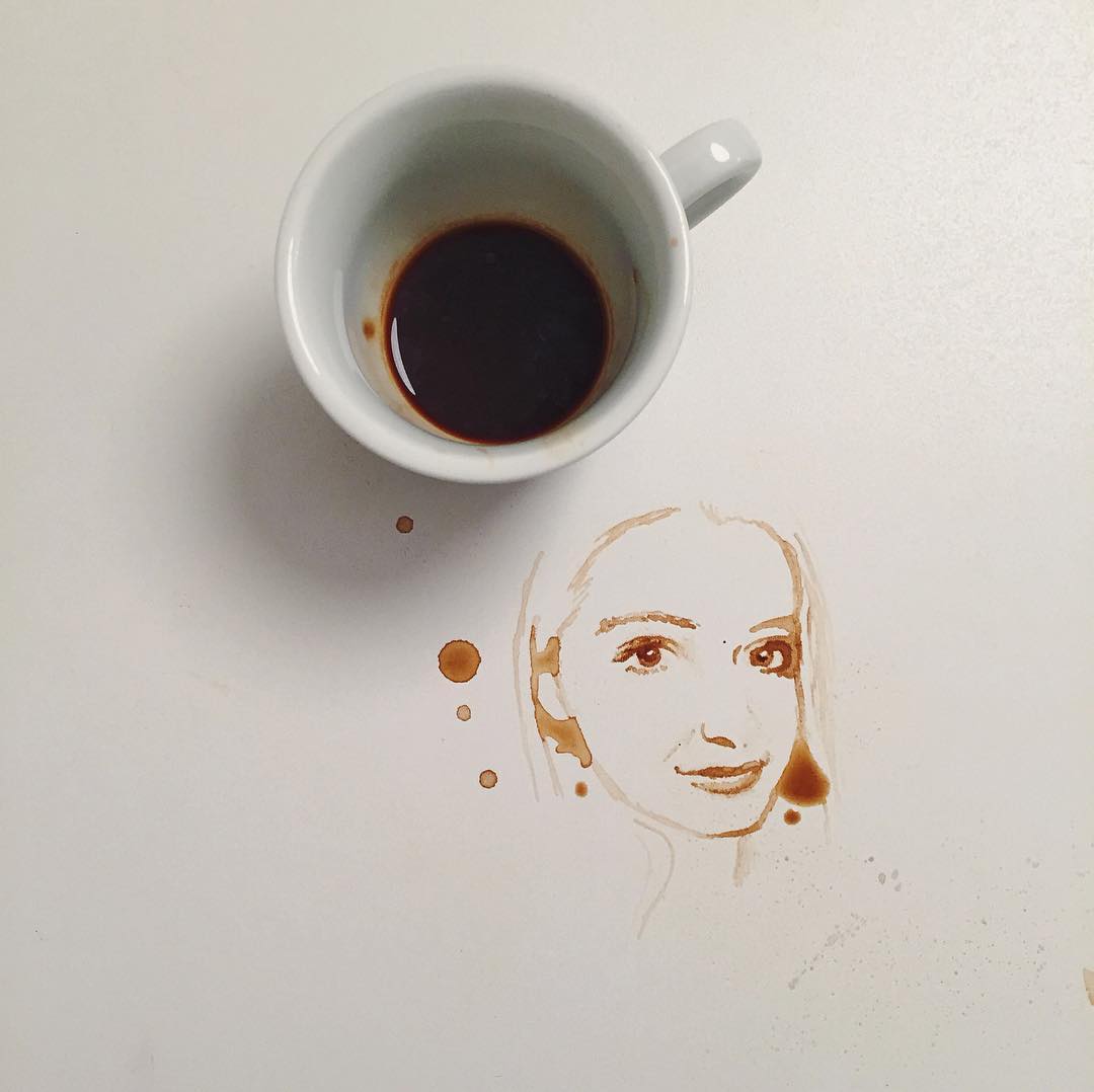 Artistic depiction of a woman's face created with coffee spills