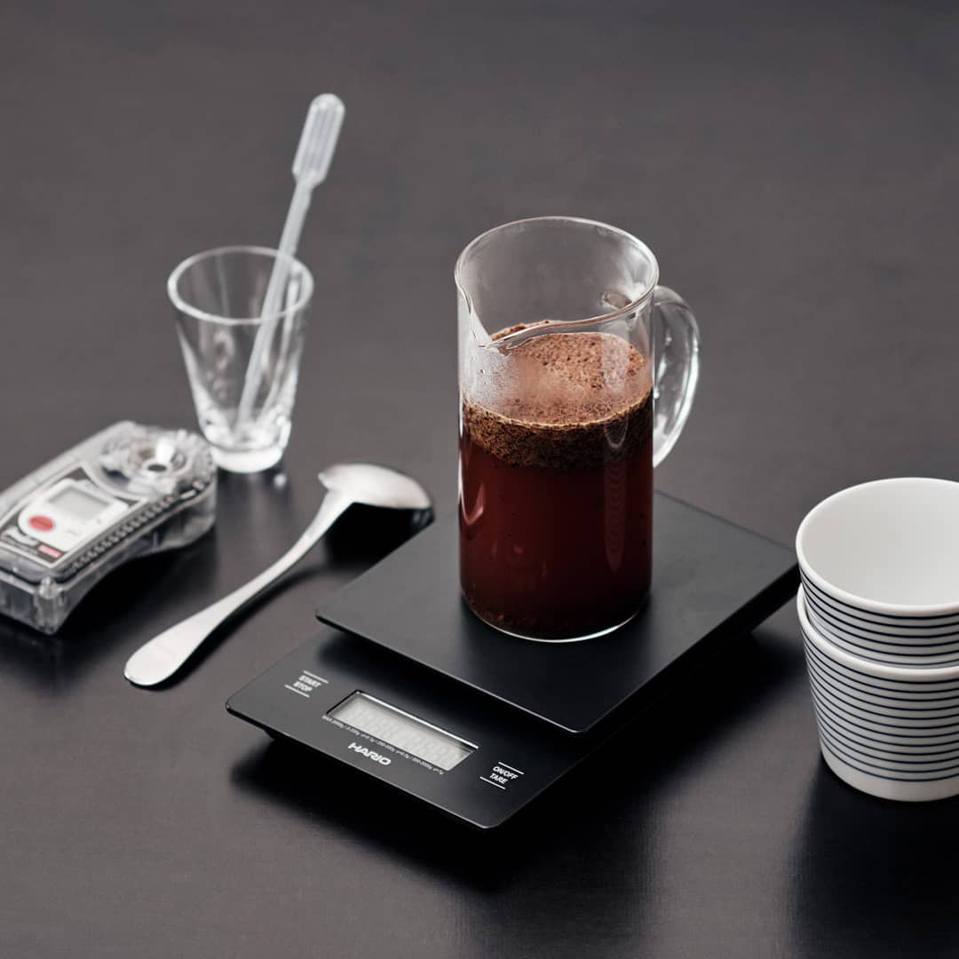 Precision coffee brewing setup with scales and timer