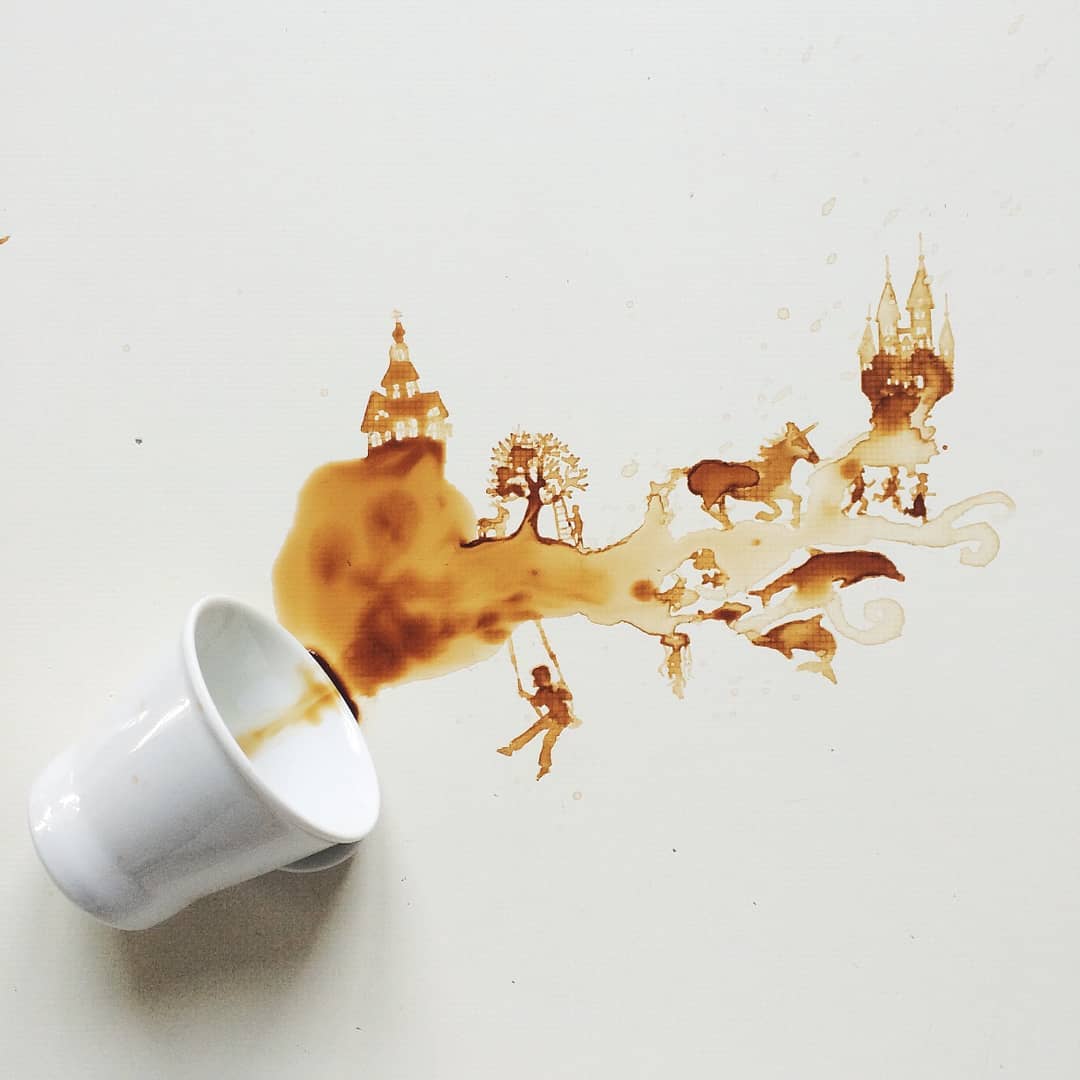 A whimsical spill of coffee artistically transforms into a fantasy scene